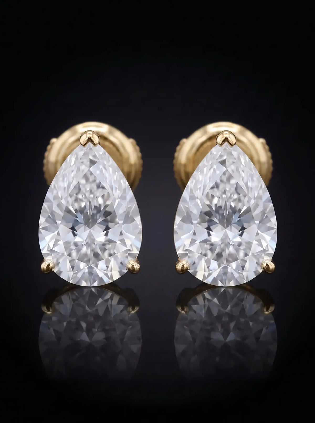 Diamond Studs - Pear - One Carat, Yellow Gold